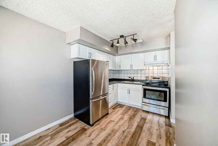 Property Photo:  16340 109 Street NW 112  AB T5X 2T4 