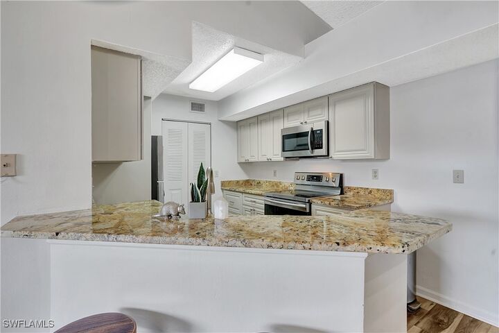 Property Photo: 13615 Eagle Ridge Drive 1633 FL 33912