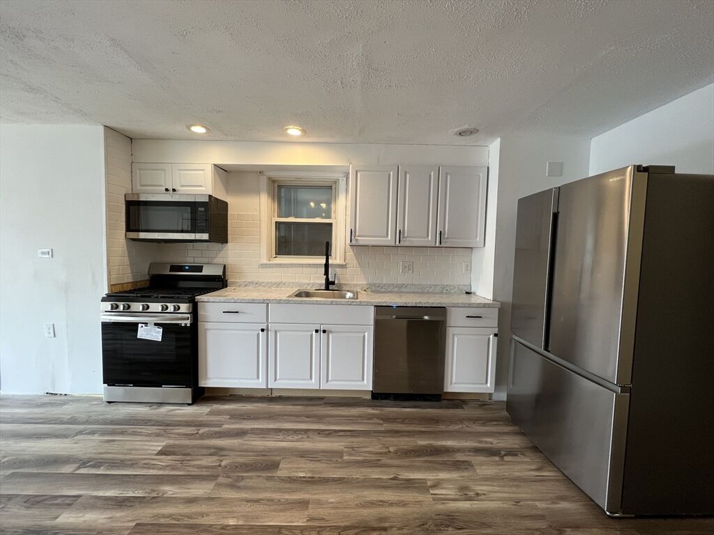 Property Photo:  209 Lexington 1  MA 02128 