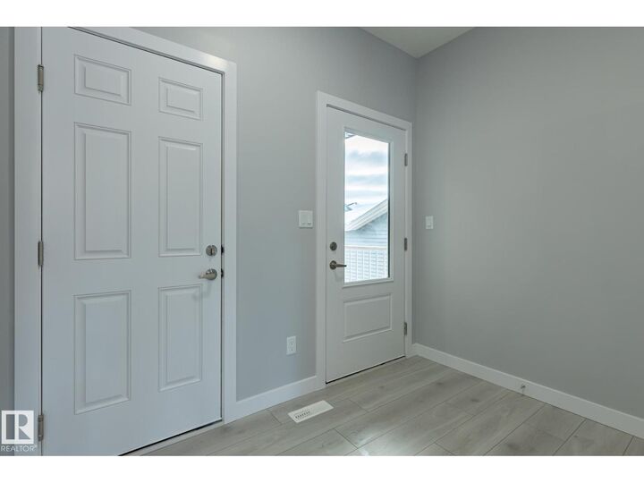Property Photo:  10714 99 St  AB T8R 2R8 