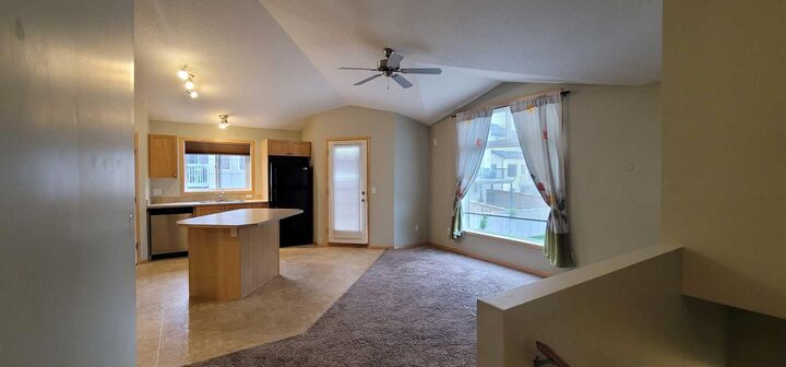 Property Photo: 80 Panatella Landing NW 206 AB T3K 0K8