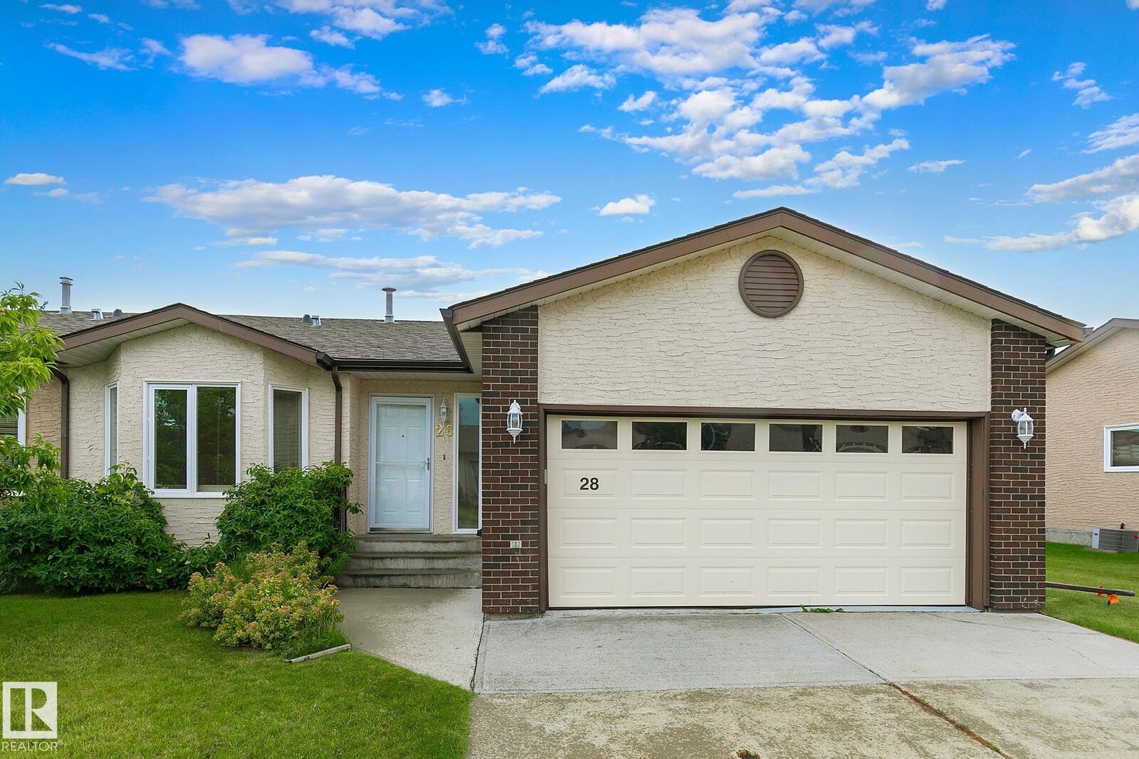 Property Photo: 28 Sunrise Village AB T7Z 1L2