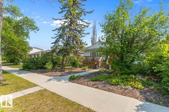 Property Photo:  11027 122 Street NW  AB T5M 0B2 