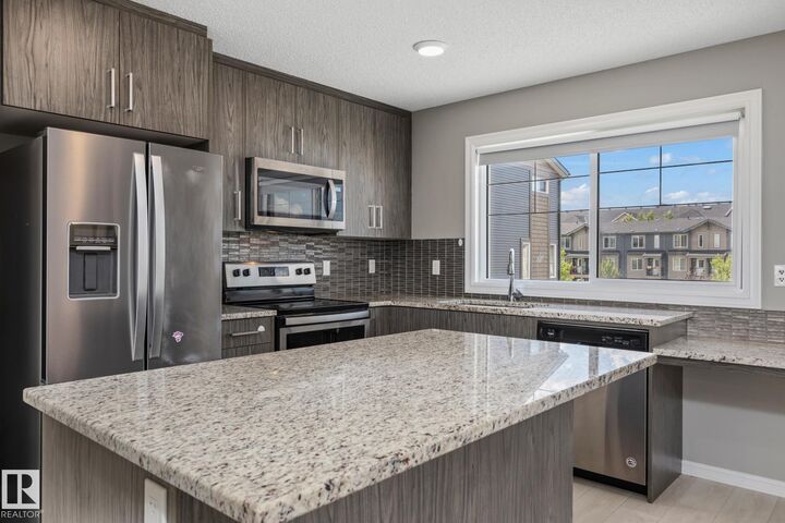 Photo de la propriété:  3025 151 Avenue NW 2  AB T6Y 3W4 