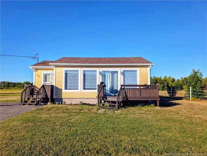 Property Photo: 49 Rue Des Chalets NB E8P 1V8