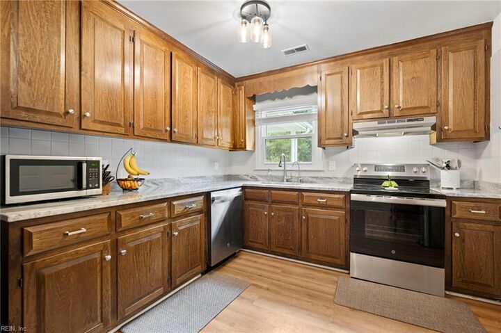 Property Photo: 210 Azalea Dr VA 23430