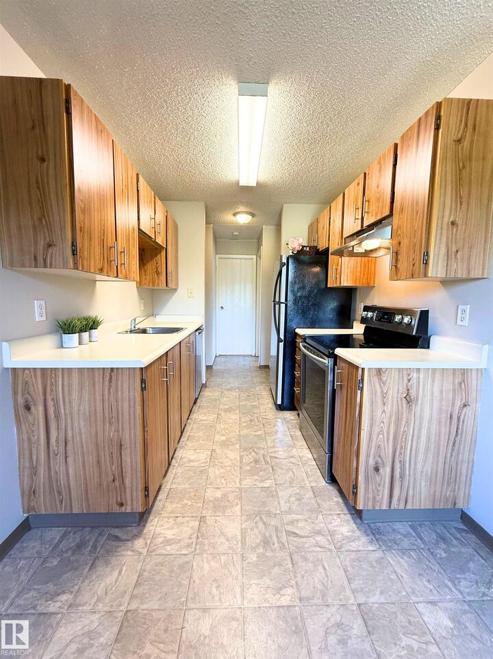 Property Photo:  10842 107 Street NW 303  AB T5H 2Z3 