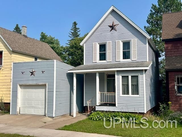 Property Photo:  310 Iroquois Street  MI 49913 