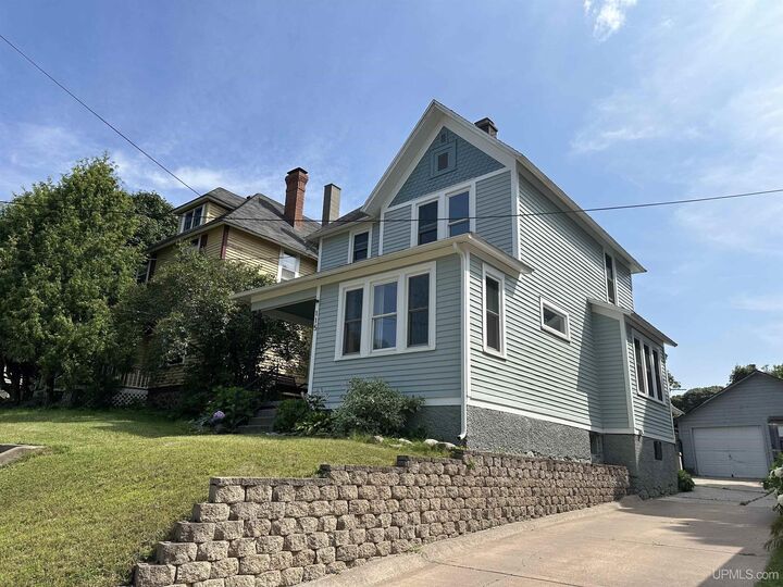 Property Photo:  115 W Crescent Street  MI 49855 