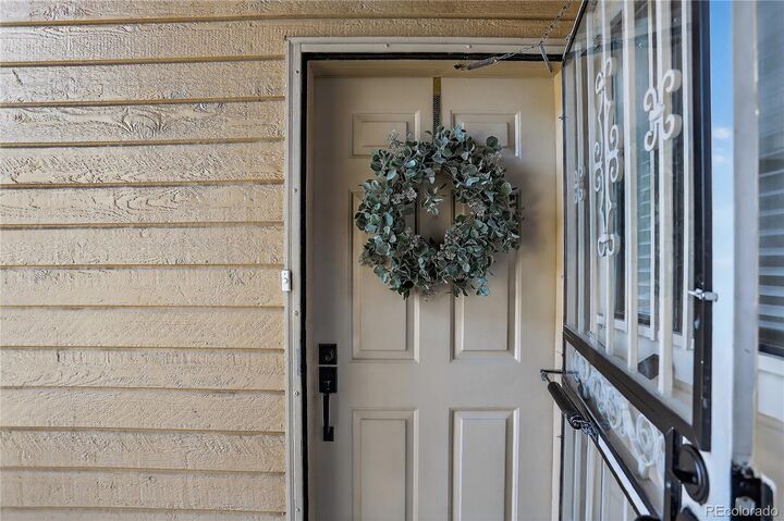 Property Photo: 15350 E Arizona Avenue 106 CO 80017