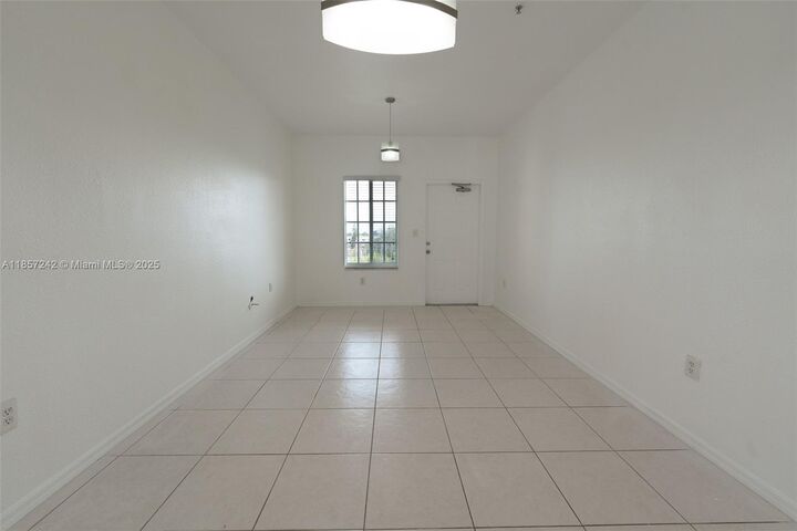 Property Photo:  6930 NW 179th St 407-8  FL 33015 