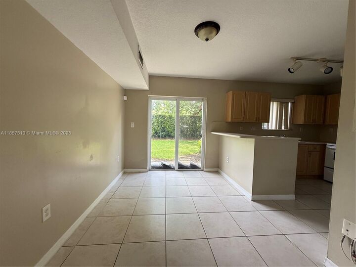 Property Photo:  3390 NE 9th St 104  FL 33033 