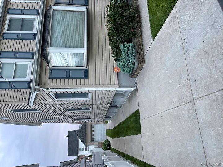 Property Photo:  114-28 208th Street  NY 11411 