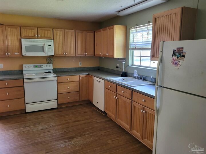Property Photo:  5329 E Avenida De Golf  FL 32571 