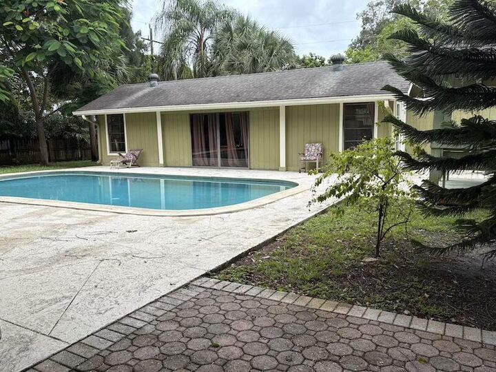 Property Photo:  4949 Belvedere Road Pool House  FL 33415 