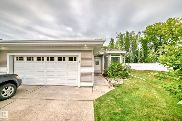 Property Photo: 1 Hendrie Drive AB T7X 2S4