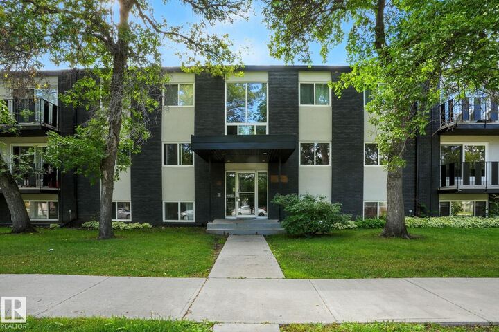 Property Photo: 10720 127 Street NW 201 AB T5M 0S3