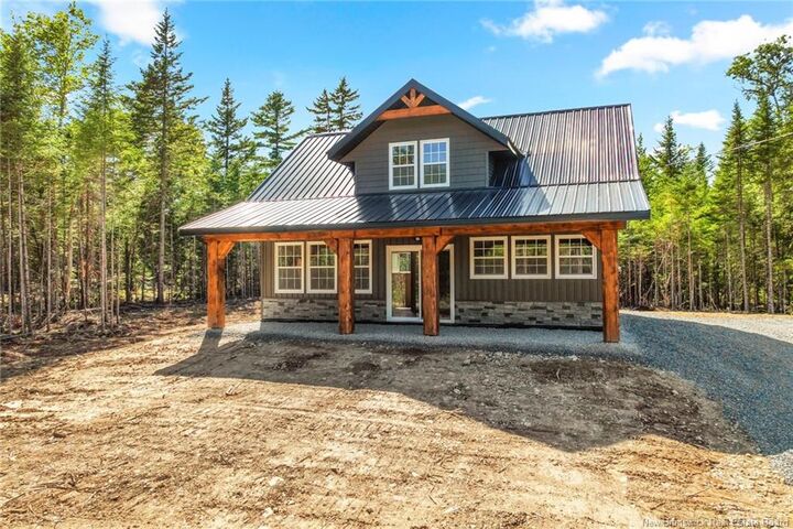 Property Photo:  114 John Chessie Drive  NB E6K 2Z6 