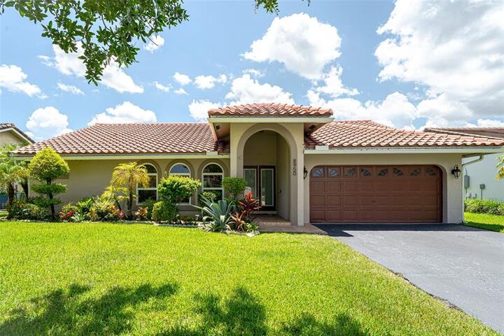 Property Photo:  8950 NW 45th Ct  FL 33065 
