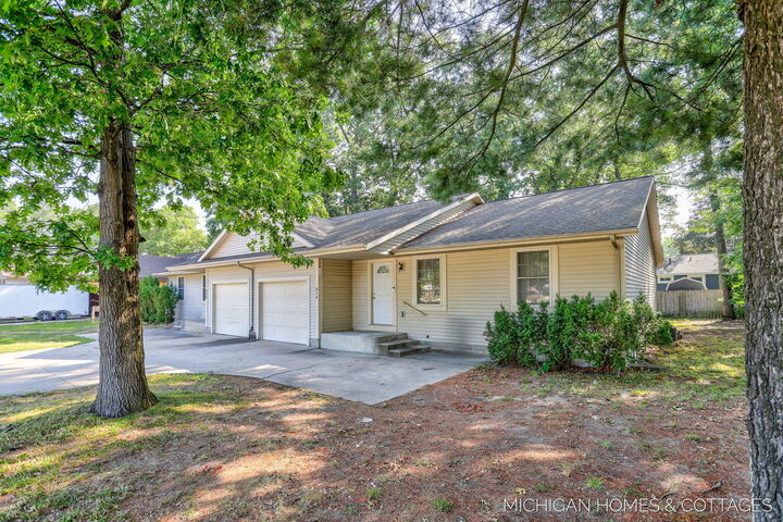 Property Photo:  508 512 Quarterline Road  MI 49442 