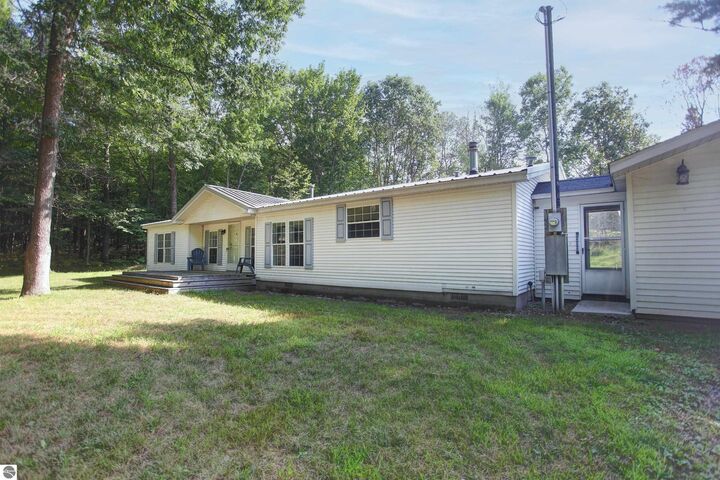 Property Photo:  8303 E Sparling Road  MI 49633 