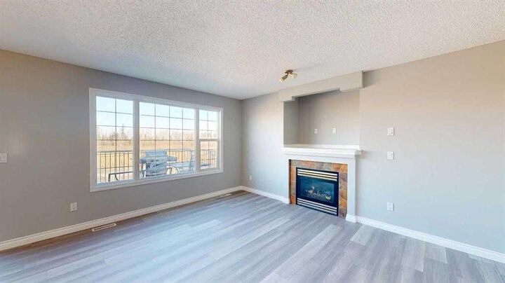 Property Photo:  334 Grosbeak Way  AB T9K 0L8 
