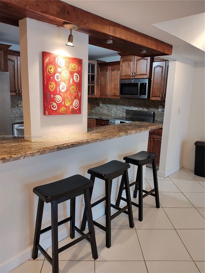 Property Photo: 9735 NW 52nd St 411 FL 33178