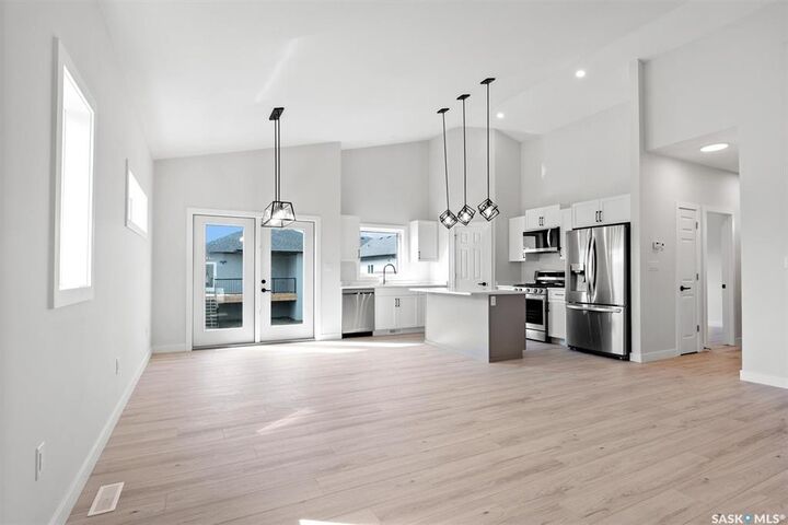 Property Photo:  206 Flynn Bend  SK S7V 1R9 