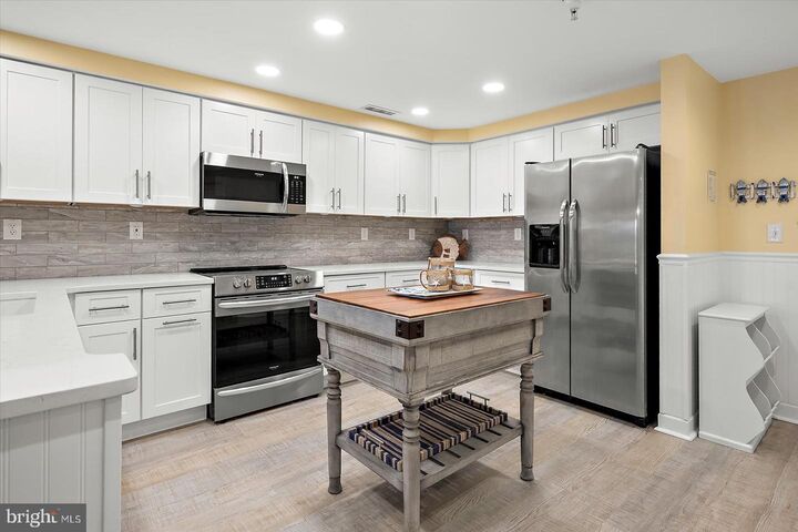 Property Photo:  104 125th Street 106  MD 21842 