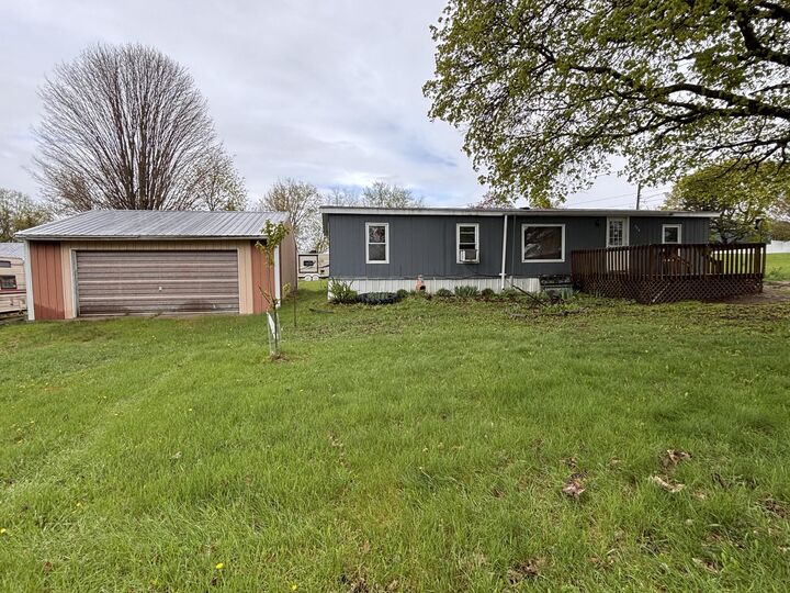 Property Photo:  208 Clark Street  MI 48850 