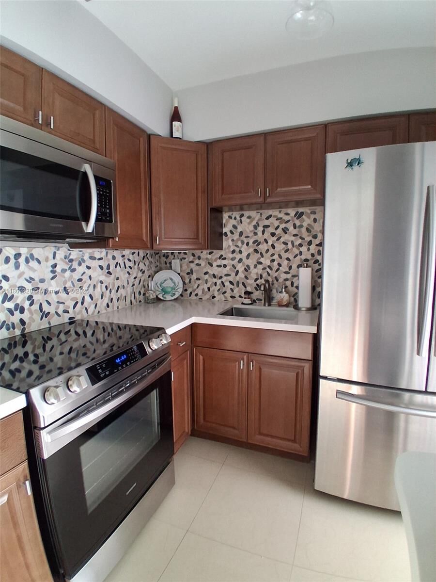 Property Photo:  6560 Winfield Blvd 204  FL 33063 