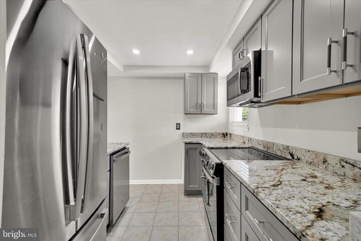 Property Photo:  10067 Campus Way S 91  MD 20774 