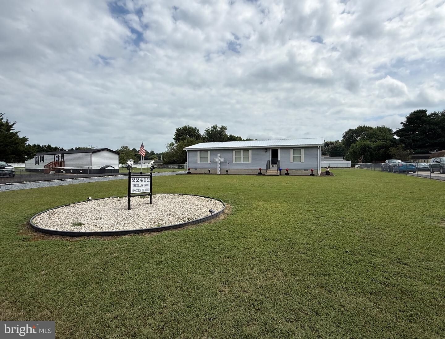 Property Photo:  22412 Deer Park Trail  DE 19960 