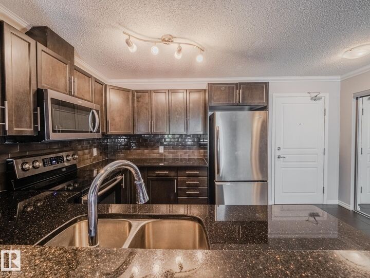 Property Photo:  2436 Guardian Road NW 434  AB T5T 2P5 
