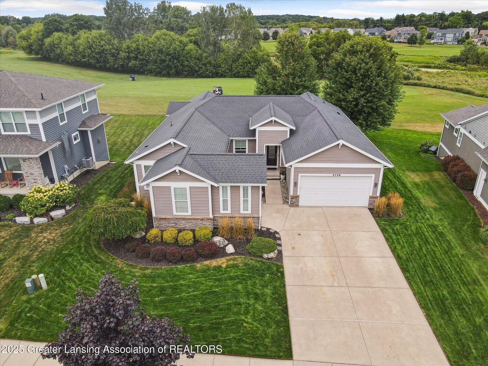Property Photo:  2726 Kittansett Drive  MI 48864 