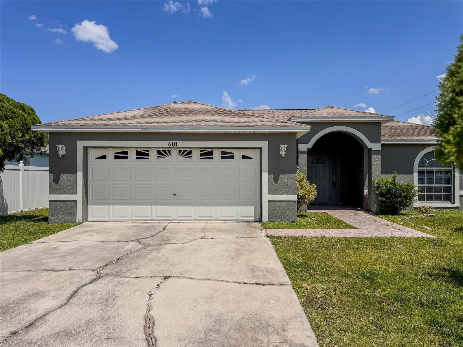 Property Photo: 601 Bobcat Lane FL 34759