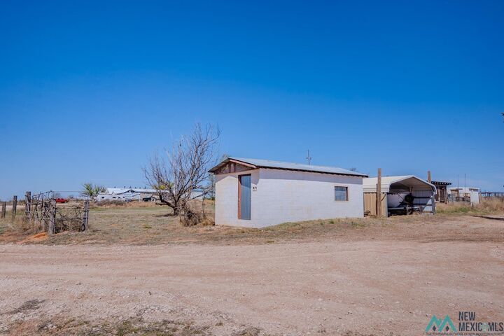 Property Photo:  305 S Roosevelt Road O Road  NM 88130 