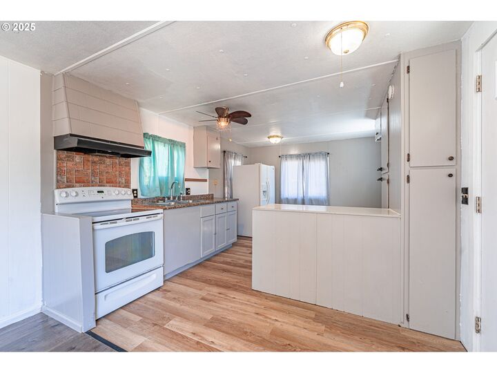 Property Photo:  34956 Seavey Loop Rd 11  OR 97405 