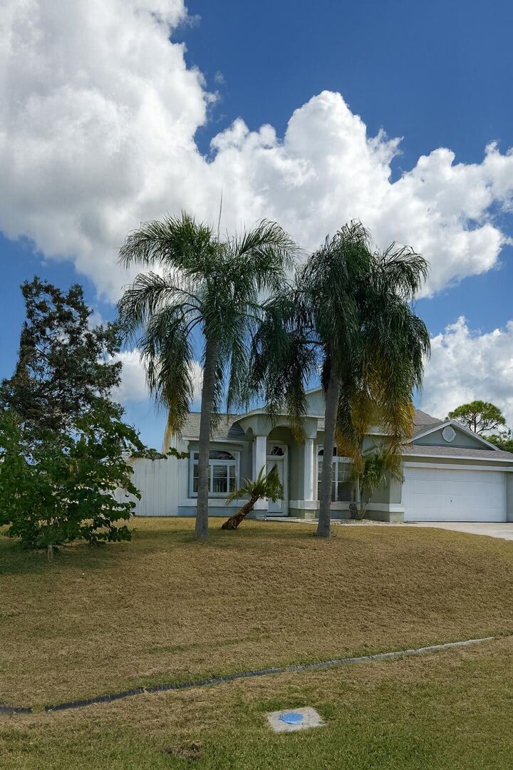 Property Photo: 1900 SW Logwood Road FL 34953