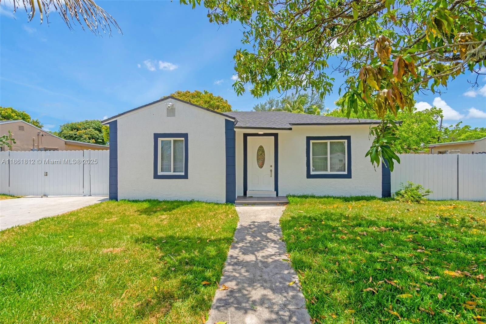 Property Photo: 910 NW 123rd St FL 33168