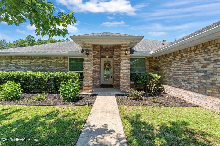 Property Photo: 3022 Hidden Oaks Drive FL 32068