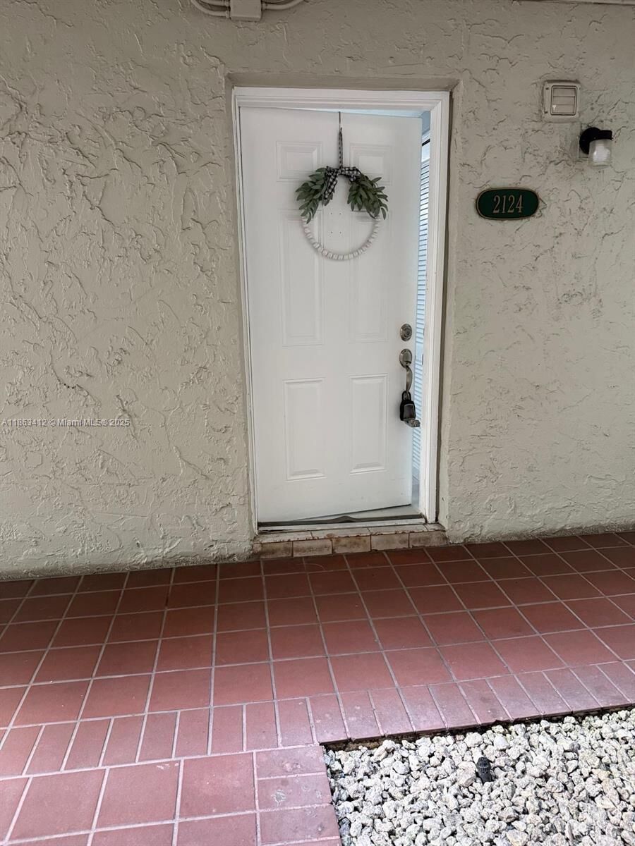 Property Photo:  10000 NW 80th Ct 2124  FL 33016 