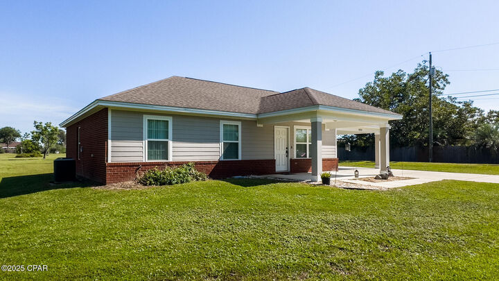 Property Photo: 8223 E Highway 22 FL 32404