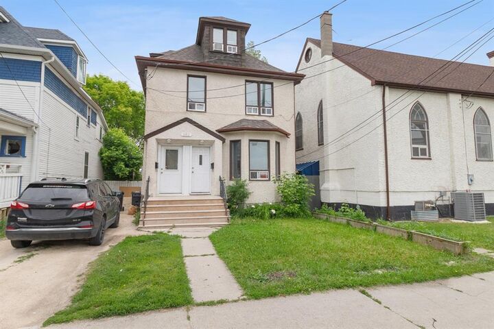 Property Photo: 383 Aikins Street MB R2W 4H2