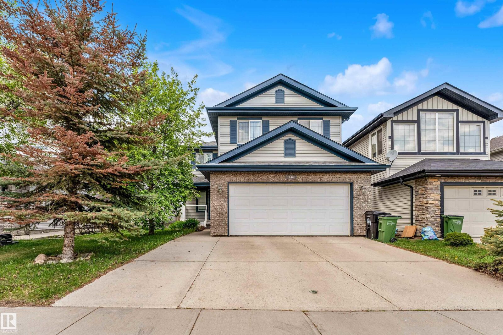 Property Photo: 144 55 Street SW AB T6X 0L2