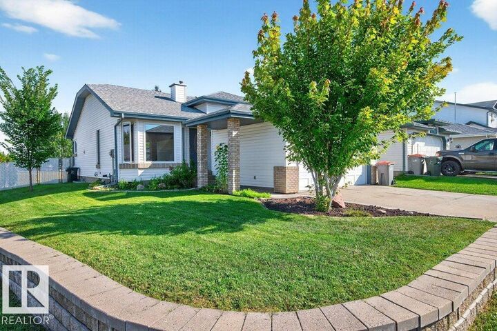 Property Photo: 94 La Costa Fairway Close AB T7Z 2A5