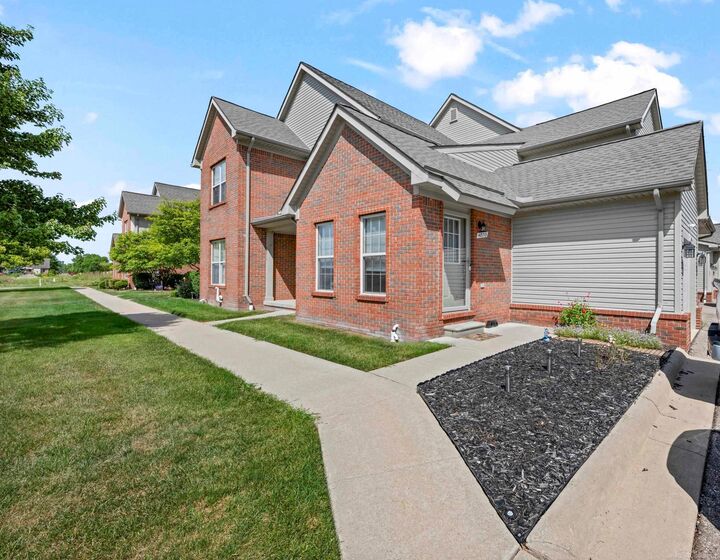 Property Photo: 48713 Chelmsford Court MI 48047