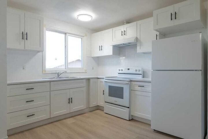 Property Photo:  4116 8 Avenue SE  AB T2A 4W4 