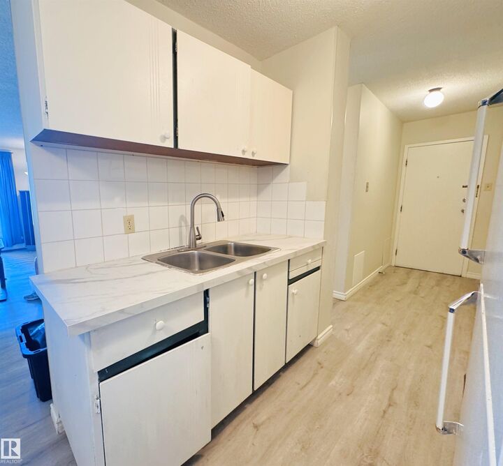 Property Photo: 207 9028 Jasper Avenue NW AB T5H 3Y6
