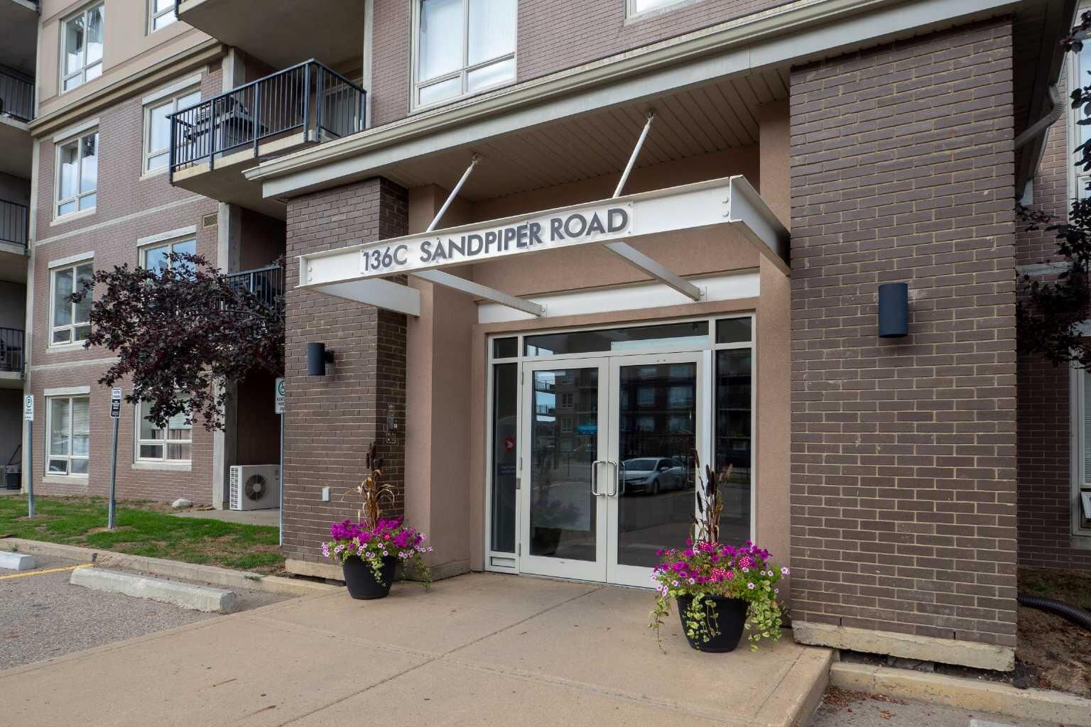 Property Photo: 136C Sandpiper Road 102 AB T9K 0J7